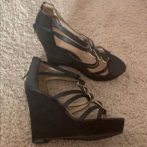 Size: US 9. EU 40. UK 7 Ingeborg black/gold wedges